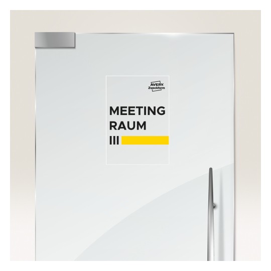 Slika prikazuje vrata s natpisom 'MEETING RAUM III' uz žutu traku i logotip 'Avery Zweckform'.