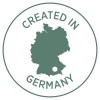 Slika prikazuje kružni logo sa siluetom Njemačke i tekstom 'CREATED IN GERMANY' oko njega, što ukazuje na podrijetlo ili proizvodnju.